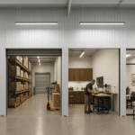 Interior view of 4 adjacent flex warehouse condo bays within a shallow-bay industrial building: the left bay as luxury storage housing a sports car, the center bay as a warehouse with pallet racking and stacked boxes, and the right bay as a hobby workshop, and the far right bay a glass-partitioned office. Overhead LED strip lights illuminate smooth concrete floors and white steel walls, showcasing the versatile 2–6 K SF spaces ideal for mixed-use industrial, storage, office, or showroom applications.